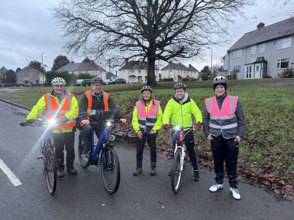 Bike Bus marshals in hi-vis vests with their bikes