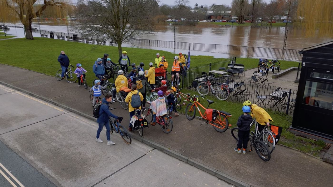 Riders gathering by the river